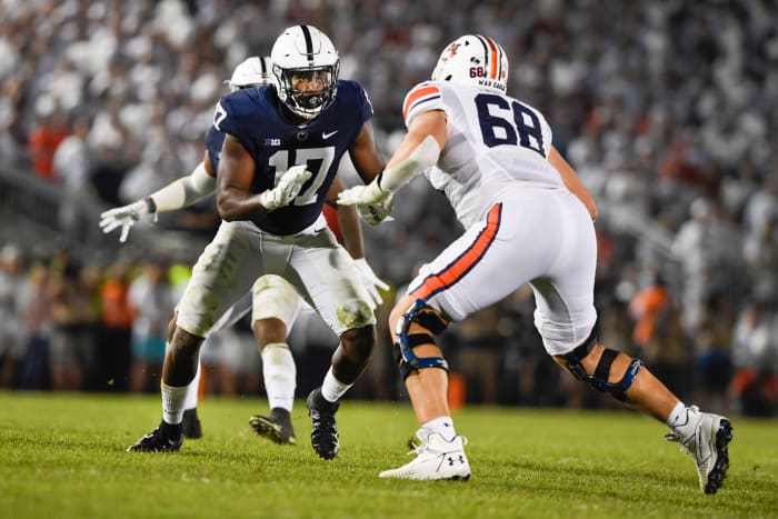 Penn State defensive end Arnold Ebiketie (17) rushes against Auburn offensive lineman Austin Troxell (68) during an NCAA college football game in State College, Pa., on Saturday, Sept.18, 2021. (AP Photo/Barry Reeger)